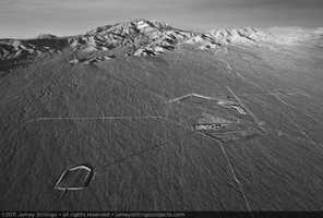 Photograph of early excavation, view west toward Clark Mountain, January 14, 2011