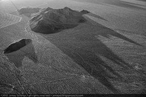 Photograph of late afternoon shadows from the hills to the east of Units 2 and 3 solar fields, June 5, 2012