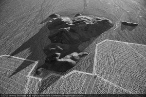 Photograph of hill formation rising above the surrounding alluvial slope at the eastern boundaries of Units 2 and 3, October 27, 2012