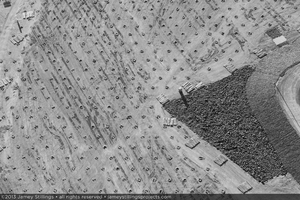 Photograph of drilled holes awaiting pylon installation, Unit 2, March 21, 2013