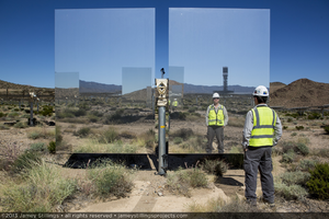Photograph of heliostats with reflection of Hagai Huss, October 1, 2013