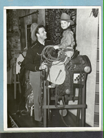 Rex Bell with Rex Bell Jr. at Walking Box Ranch, Nevada: photographic print