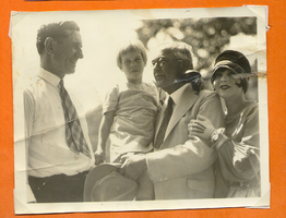 Clara Bow Bell and a group of unidentified people: photographic print
