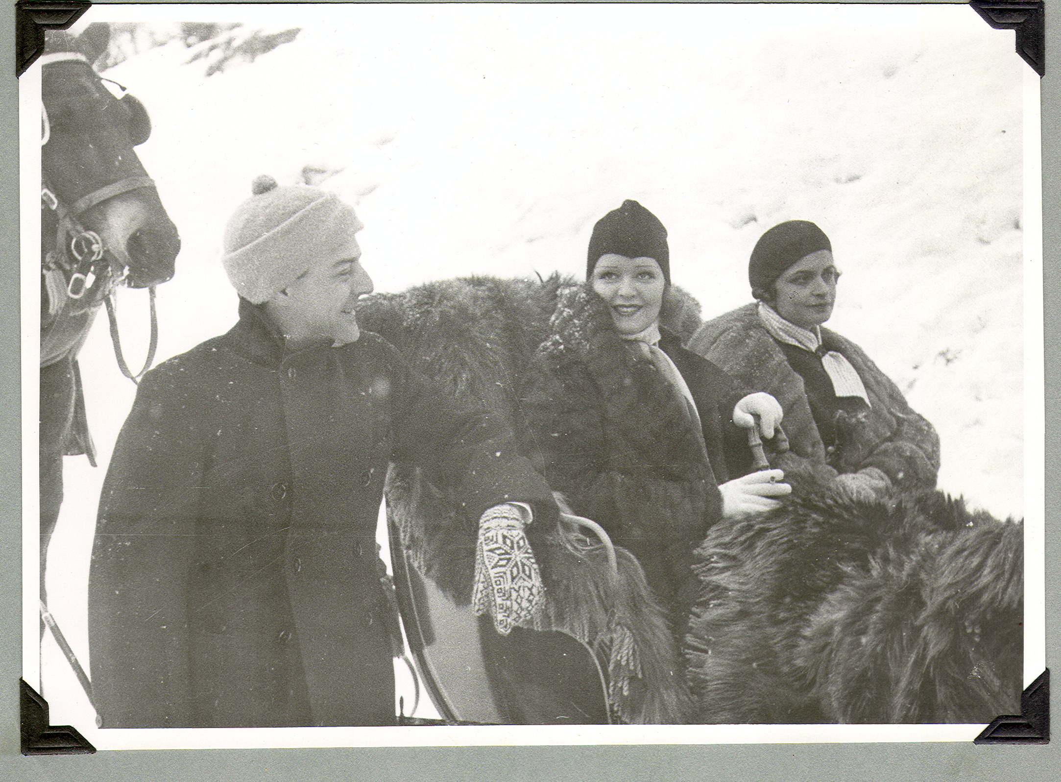 Clara Bow Bell in sleigh with unidentified man and woman on her honeymoon in Europe: photographic print