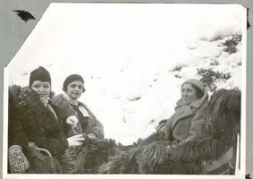 Clara Bow Bell in sleigh with two unidentified women during her honeymoon in Europe: photographic print