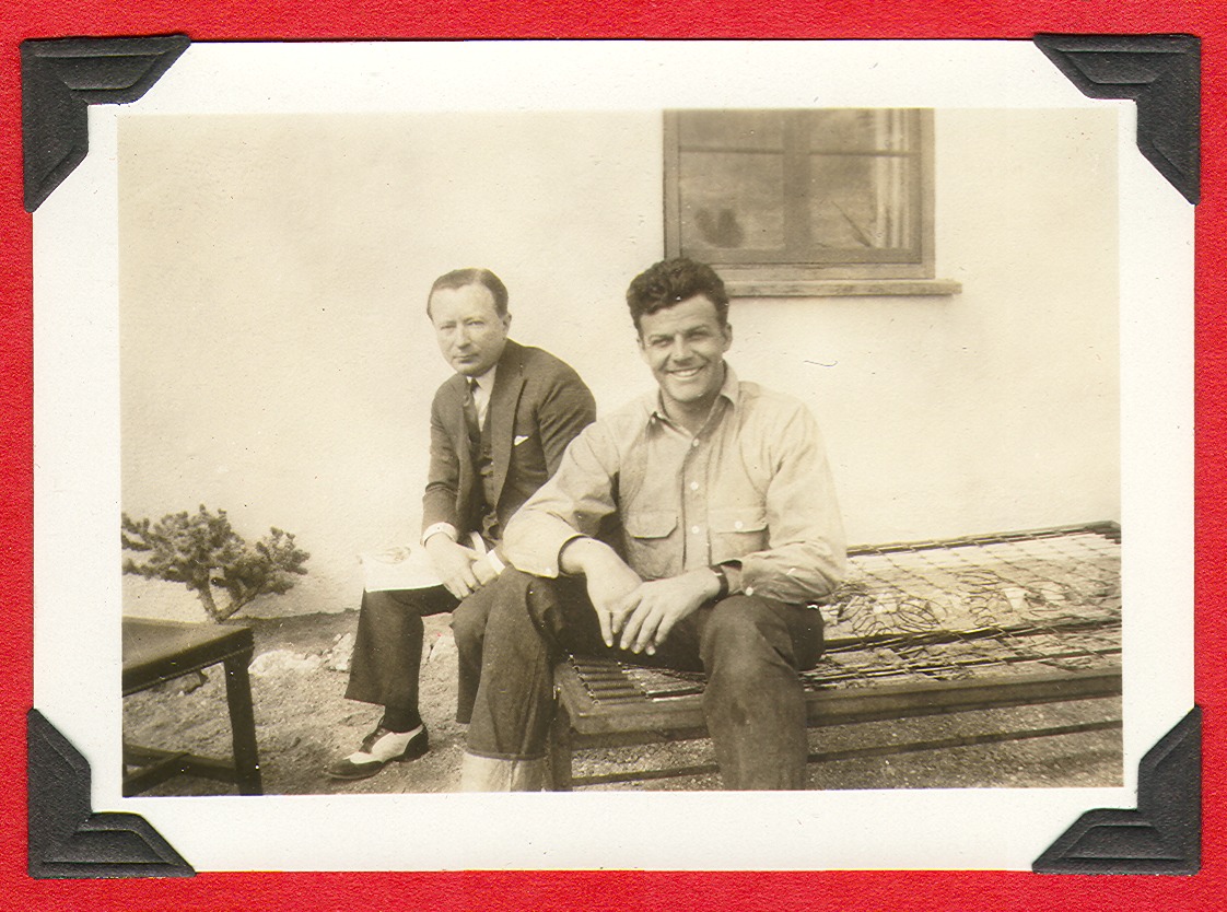 Rex Bell seated at right with unidentified man sitting outside the ranch house at Walking Box Ranch, Nevada: photographic print