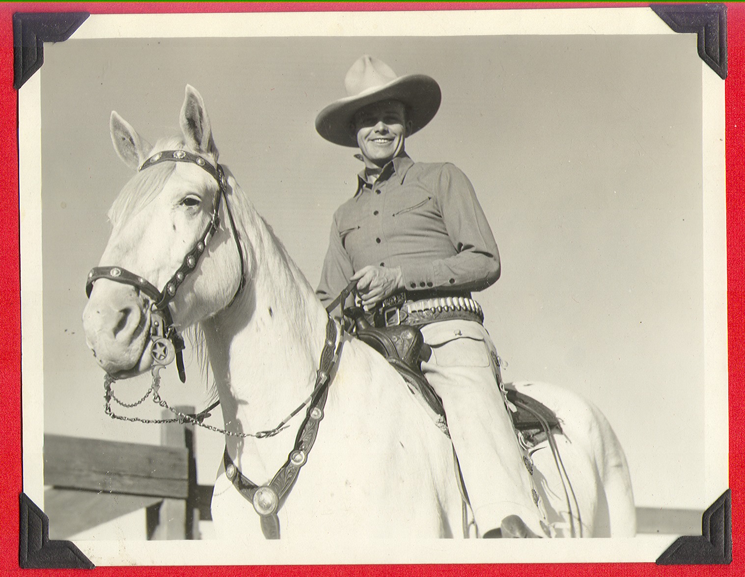 Rex Bell on horseback: photographic print