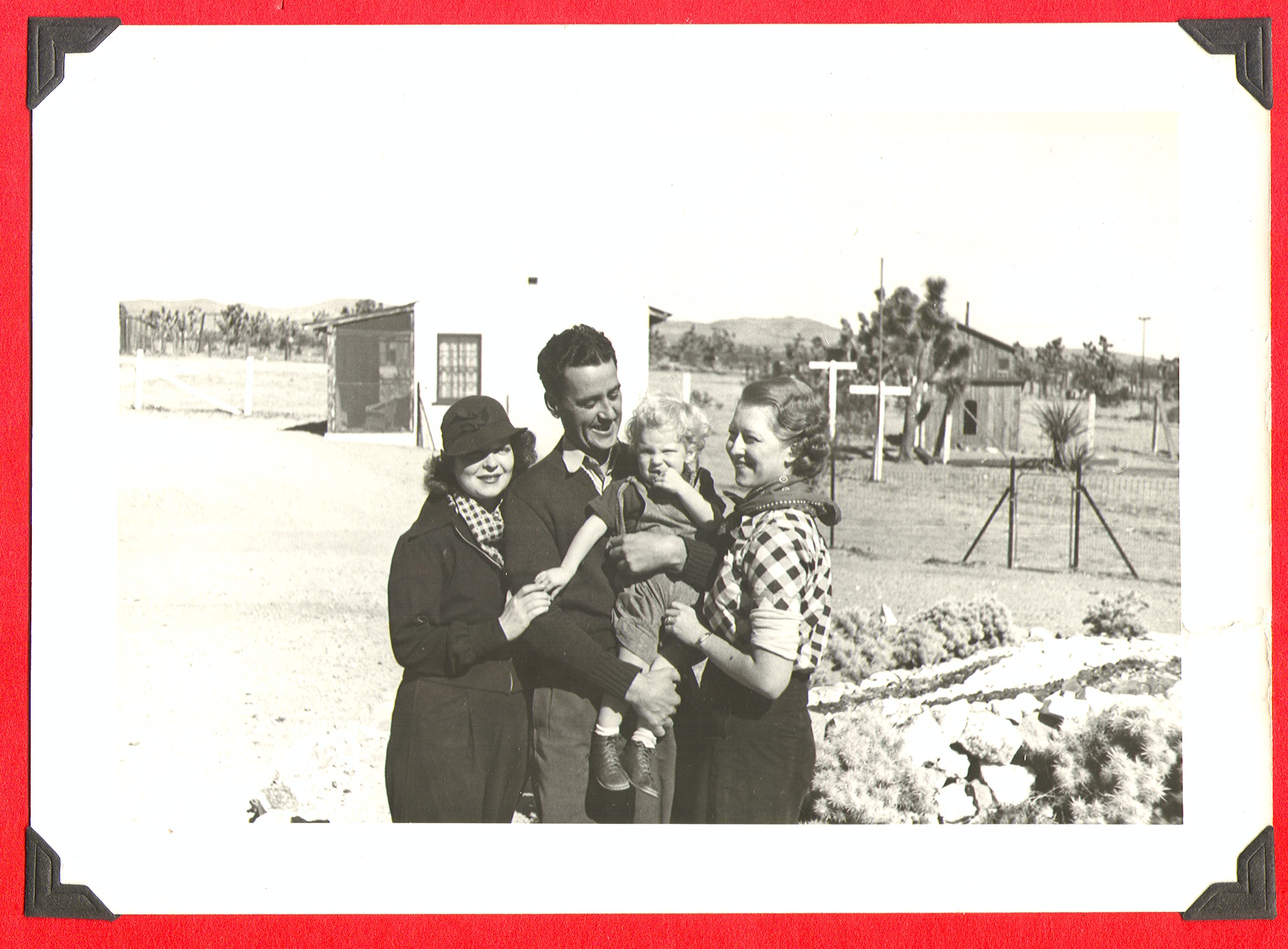 Clara Bow Bell, left, with her cousin Billy Bow. Man is holding a child, Rex Bell Jr: photographic print