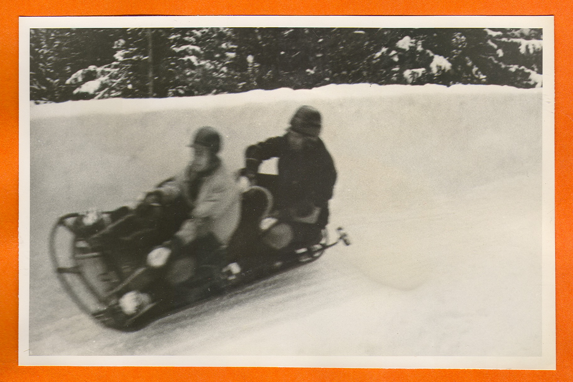 Two people on a bobsled in Europe: photographic print