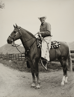 Rex Bell on horseback: photographic print