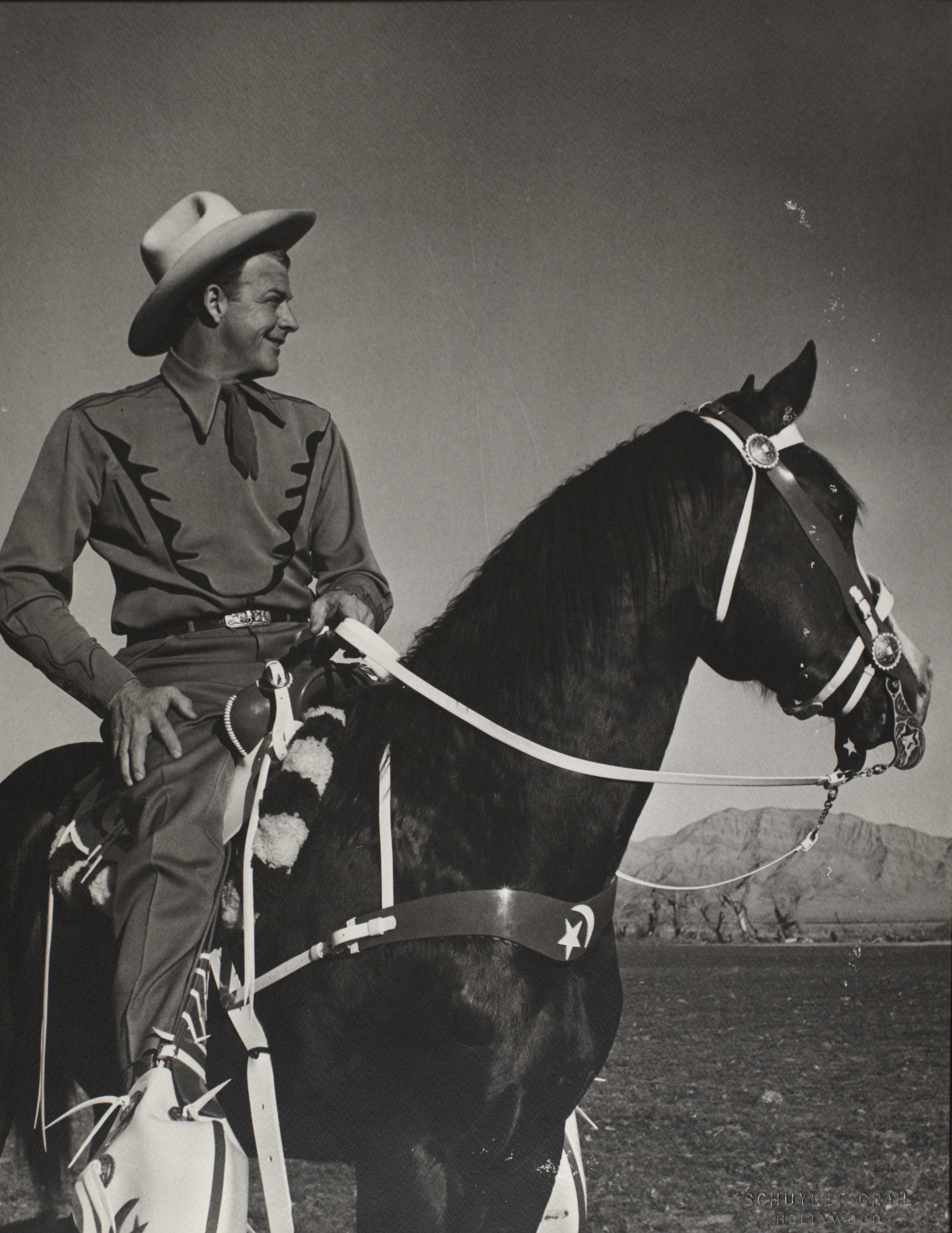 Rex Bell on horseback: photographic print