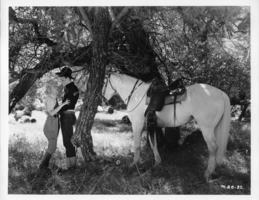 Rex Bell in movie still from unidentified movie: photographic print