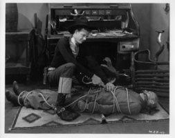 Rex Bell in movie still from unidentified movie: photographic print