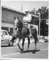 Rex Bell (George Francis Beldam) on horseback in a parade