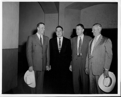 Rex Bell (George Francis Beldam) left with four unidentified people at an unknown location. Stamped on the back: Compliments of Lieutenant Governor, Harold J. Powers, Sacramento, California