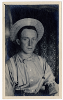 Photograph of C. A. Earle Rinker wearing a straw hat, Goldfield (Nev.), early 1900s
