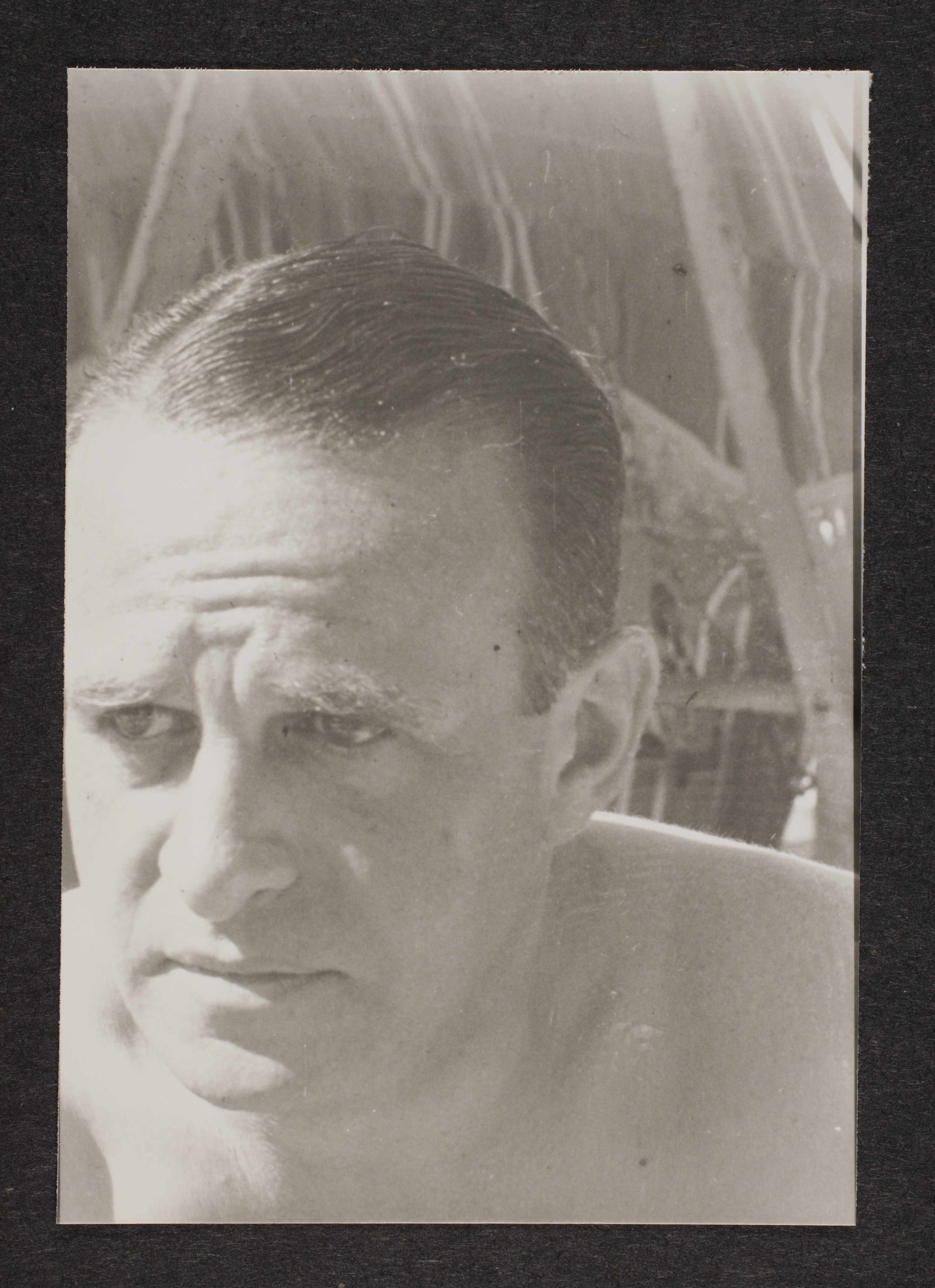 Unidentified man outside at unknown location: photographic print