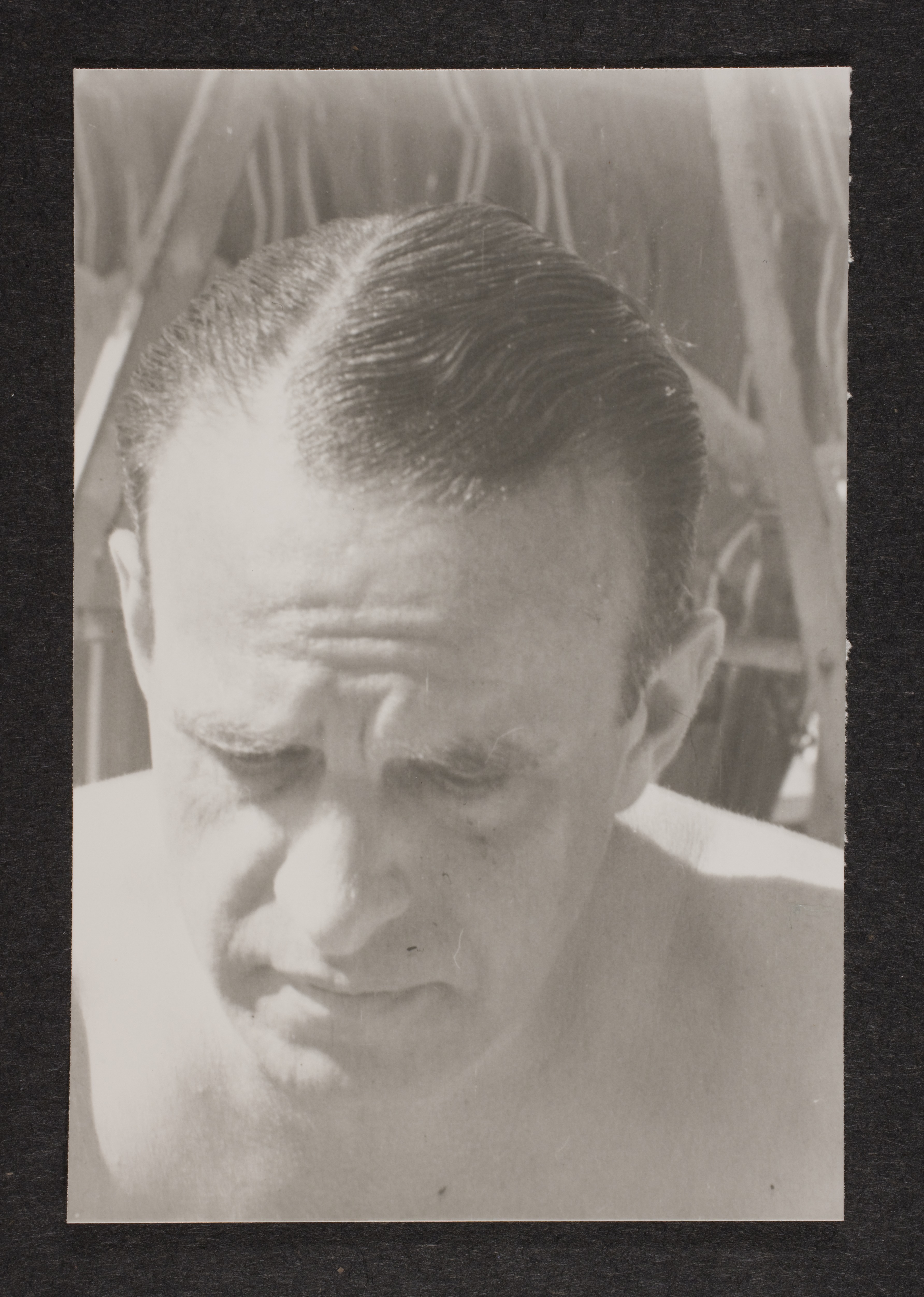 Unidentified man outside at unknown location: photographic print