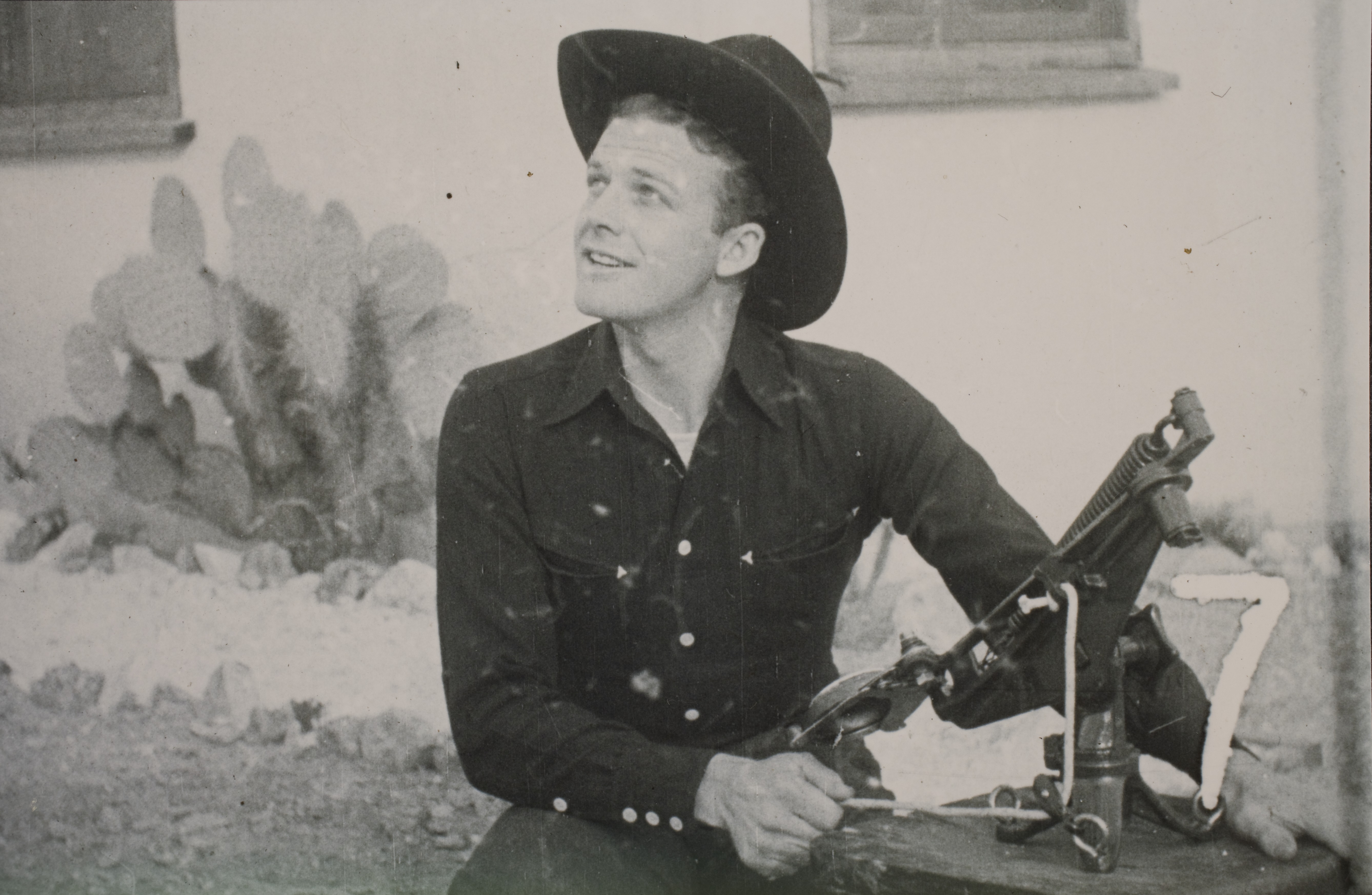Rex Bell (George Francis Beldam), with a skeet shooter outside the ranch house at Walking Box Ranch: photographic print
