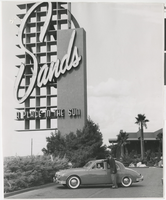 Photograph of the Sands Hotel sign and a partial view of the hotel front exterior, Las Vegas, circa 1950s