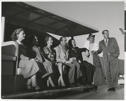 Photograph of guests seated in Sands Hotel tram, Las Vegas, circa 1950s