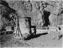 Film transparency of workers pouring concrete into the dam form, Hoover Dam, January 7, 1934