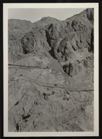Photograph of equipment being lowered into Hoover Dam construction site, circa 1930-1935