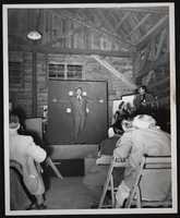 Photograph of a meeting of unidentified people, circa 1930s-1940s