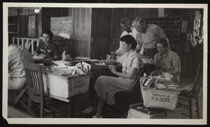 Photograph of workers in a post office, Boulder City, Nevada, circa 1930s-1940s