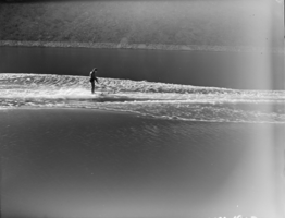 Film negative showing an aqua plane rider on Lake Mead, January 1938