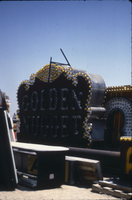 Slide of the Young Electric Sign Company (YESCO) sign graveyard, Las Vegas, 1986