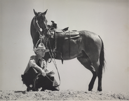 Photograph of Harry Harrison and horse, circa 1930-1940s
