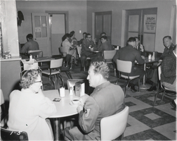 Black-and-white photograph of cafeteria at Nellis Air Force Base, Nevada, circa 1950s