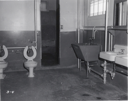 Black-and-white photograph of barracks at Nellis Air Force Base, Nevada, circa 1950s