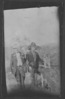 Postcard of Oscar Wellington Stocker with an unidentified man and a dog, circa early 1900s