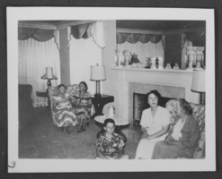 Black-and-white photograph of Stocker family members inside Harold Stocker's home, Las Vegas, Nevada, circa 1950s-early 1960s