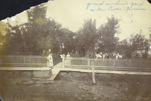 Photograph of people in front of a house in New Lisbon, Wisconsin, circa late 1800s to early 1900s
