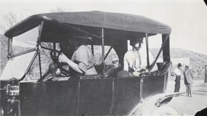 Photograph of women in an automobile, circa early 1900s