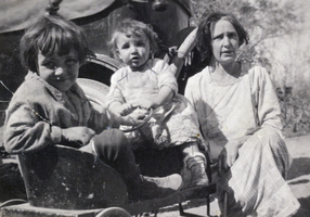 Photograph of three people, circa early 1900s