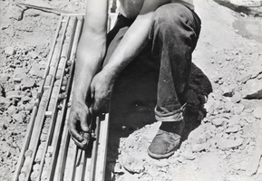 Photograph of man working at the Hoover Dam construction site, 1931