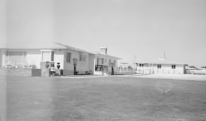 Photograph of Mayme Stocker in front of the Stocker home Las Vegas, Nevada, circa 1930's-1950's