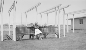 Photograph of Mayme Stocker in front of the Stocker home Las Vegas, Nevada, circa 1930's-1950's