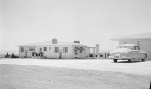 Photograph of Mayme Stocker in front of the Stocker home Las Vegas, Nevada, circa 1930's-1950's