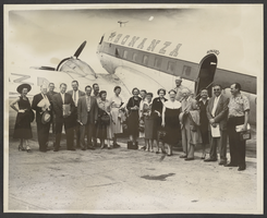 Photograph of people boarding a Bonanza craft, Las Vegas, May 17, 1956