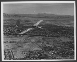 Aerial photograph of an airplane flying over Las Vegas, Nevada, circa 1982-1990s