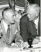 Black-and-white photograph of Wilbur Clark with two unidentified men, Las Vegas, Nevada, April 1951