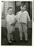 Black-and-white photograph of Wilbur Clark with an unidentified boy, circa 1912-1914