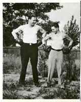 Black-and-white photograph of Wilbur Clark and an unidentified man, both wearing boxing gloves, Keyesport, Illinois, circa late 1920s-early 1930s