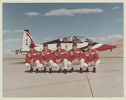 Photograph of Thunderbirds pilots next to a plane, Nellis Air Force Base, Nevada, August 7, 1974