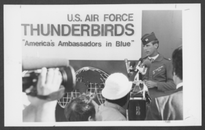 Photograph of Captain Dale Cooke speaking to the press at Nellis Air Force Base, Nevada, January 20, 1982